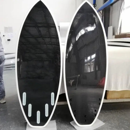 Carbon fiber wakesurf and skimboard with fin